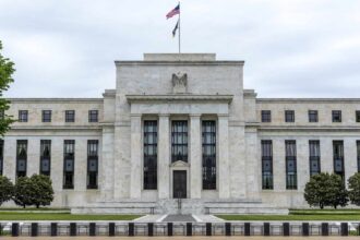 The U.S. Federal Reserve keeps interest rates unchanged as markets react cautiously. Key tech companies announce strategic moves amid economic uncertainty.