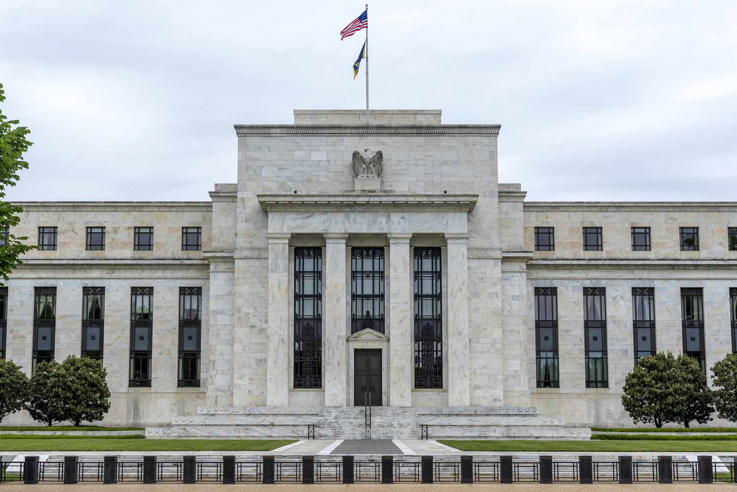 The U.S. Federal Reserve keeps interest rates unchanged as markets react cautiously. Key tech companies announce strategic moves amid economic uncertainty.